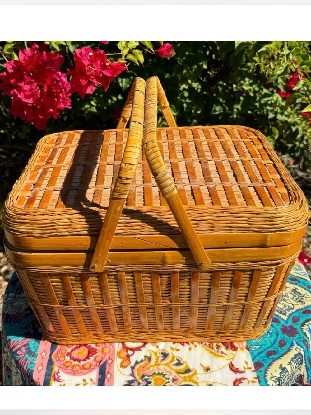 Large Vintage Handmade tan rattan picnic basket with handles.